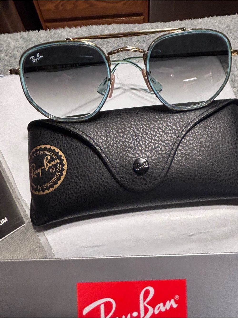 Ray-Ban Women’s Marshal ll blue/Gold Frame Sunglasses with Blue Gradient Lenses